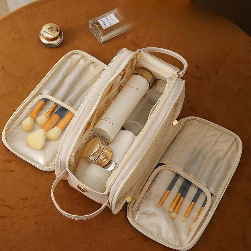 Double zipper cosmetic bag with makeup brushes and bottles, stylish and organized for household storage.