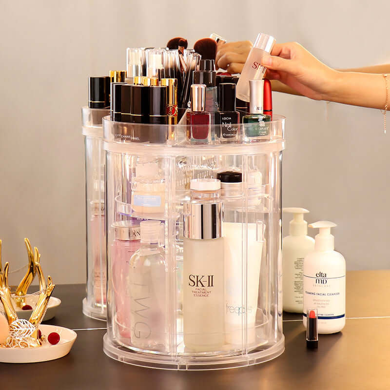 Rotating cosmetics storage rack displaying various beauty products and makeup brushes on a stylish vanity.