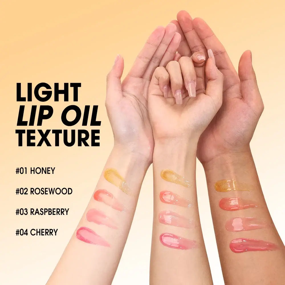 Light lip oil texture on arms showcasing shades: Honey, Rosewood, Raspberry, and Cherry.