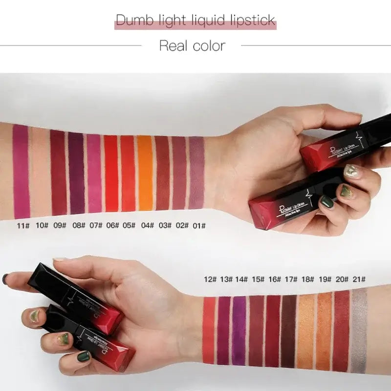 Swatches of Dumb Light Liquid Lipstick showcasing real colors on arms with multiple shades and lipstick tubes.
