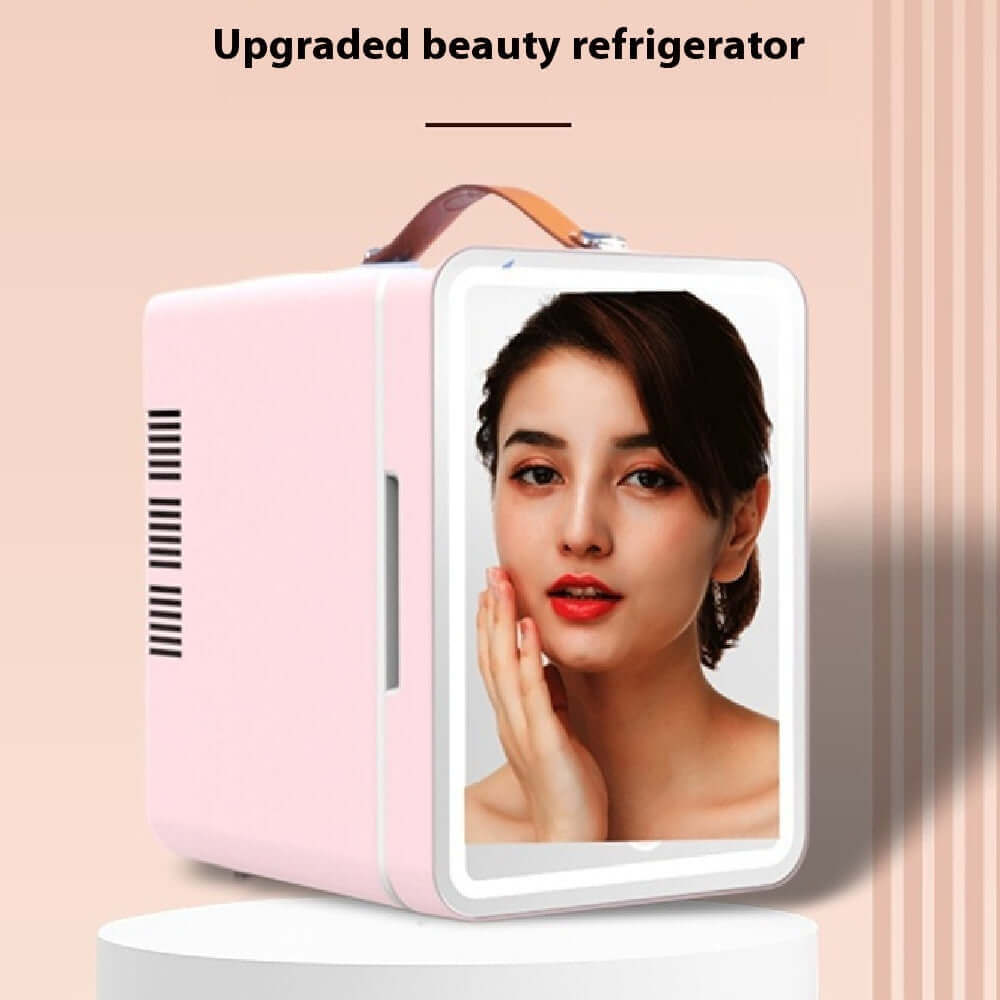 Mini beauty refrigerator with LED lights and mirror in pink, perfect for skincare storage.