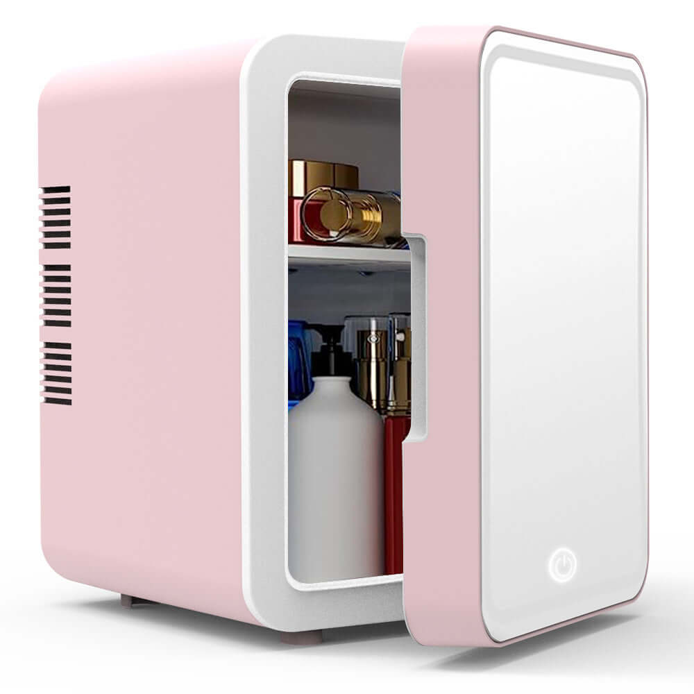 Mini beauty refrigerator in pink with opened door, showcasing skincare products inside.