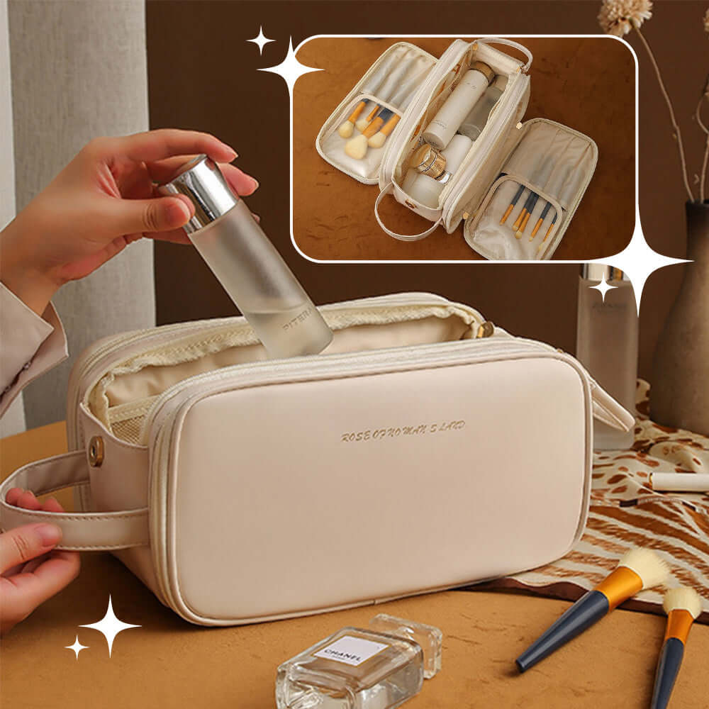 Double zipper cosmetic bag in beige with compartments for organizing beauty products.