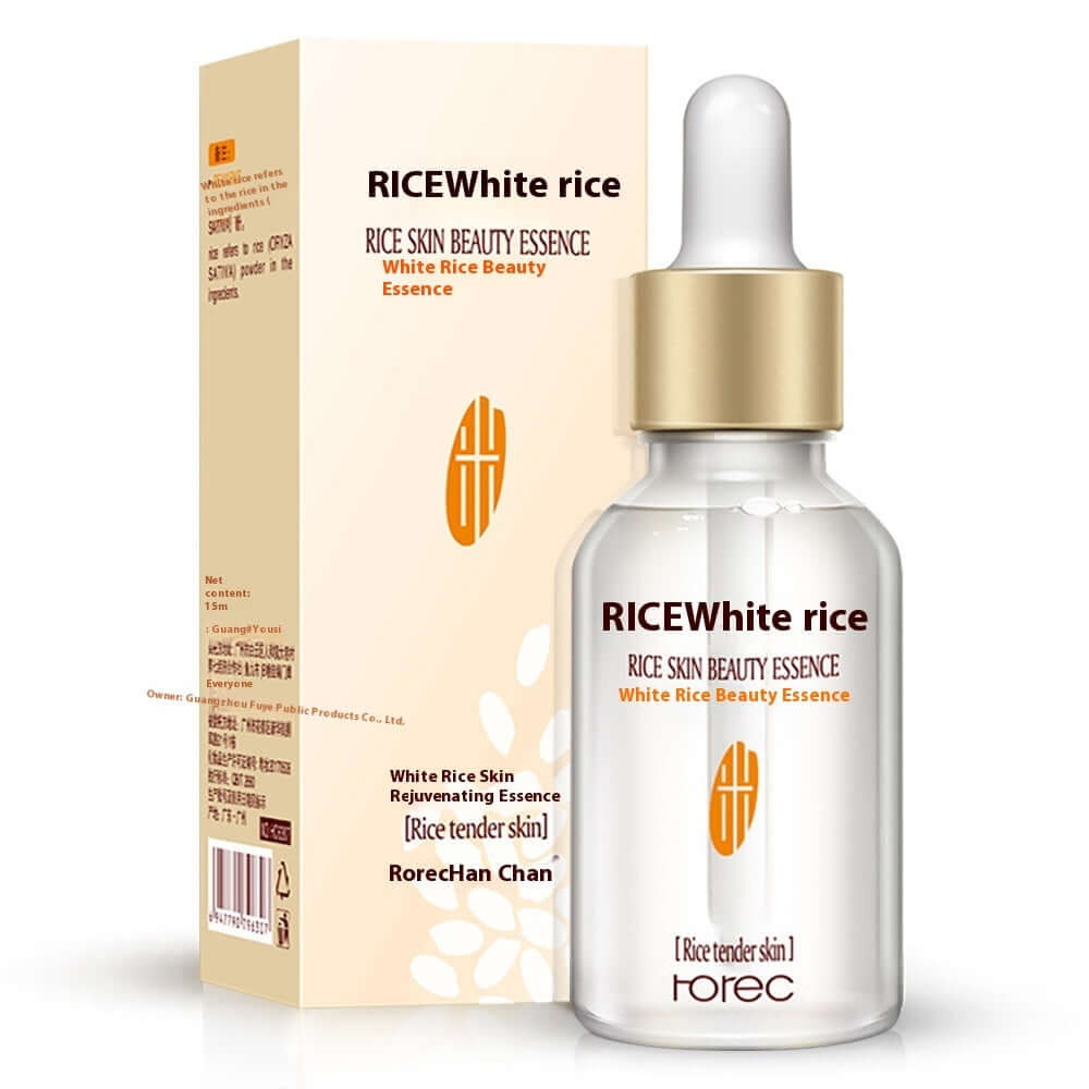 RICEWhite Rice Skin Beauty Essence serum bottle with a golden dropper and beige packaging, promoting skin rejuvenation.