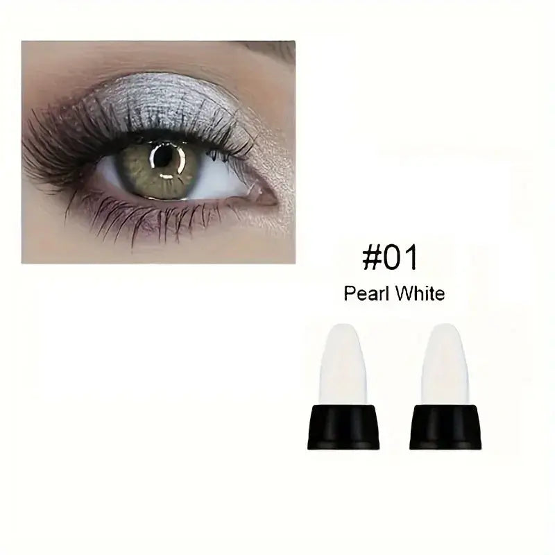 Close-up of an eye with pearl white glitter eyeliner #01, showcasing shimmering effect and dramatic lashes.
