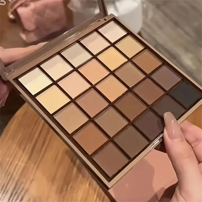 25 color eyeshadow palette featuring neutral gray and brown tones for versatile makeup looks.