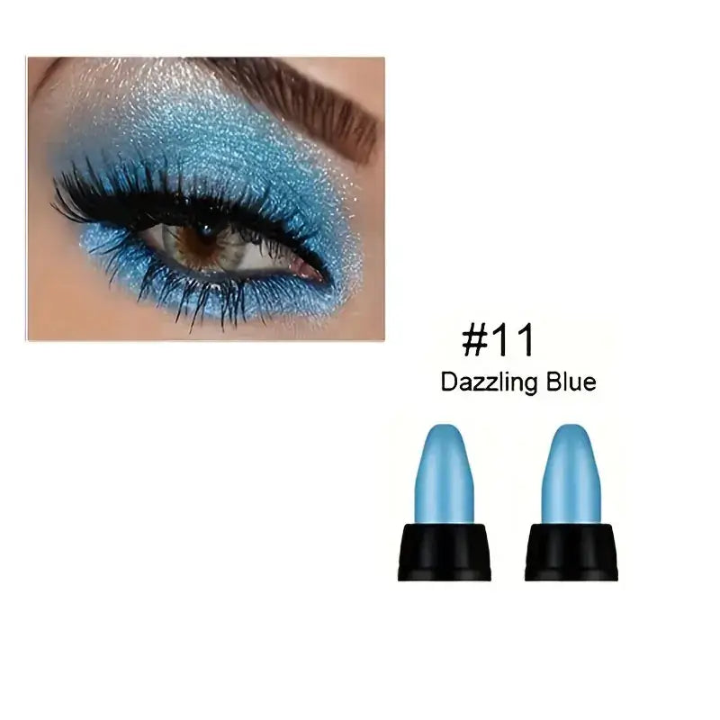 Close-up of eye makeup featuring dazzling blue glitter eyeliner and lashes.