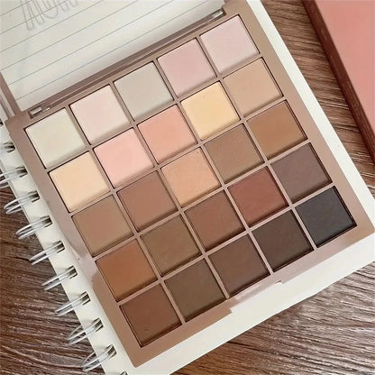 25-color eyeshadow palette featuring neutral gray and brown earthy tones, ideal for versatile makeup looks.