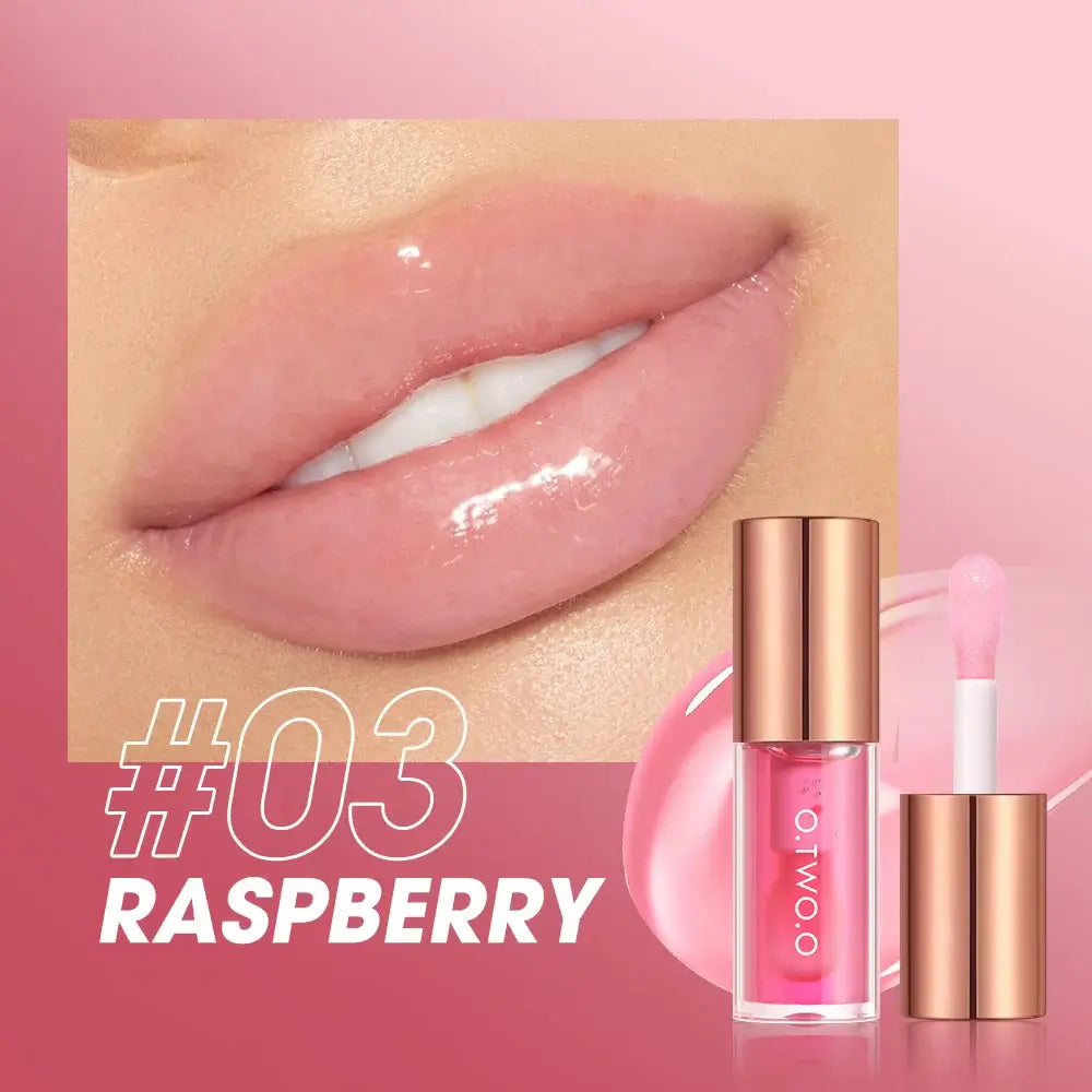 O.TWO.O Lip Plumper Gloss in Raspberry shade displayed on glossy lips with applicator.